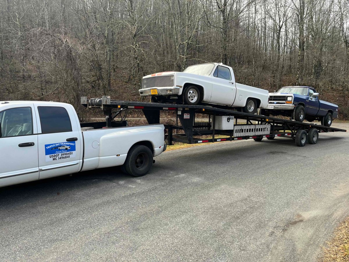 Triple J&C flatbed tow truck side profile